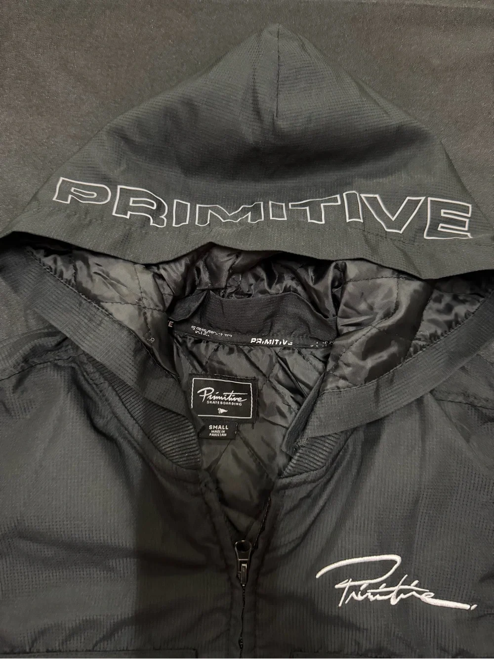 Primitive Black Hooded Utility Vest with Chest Logo